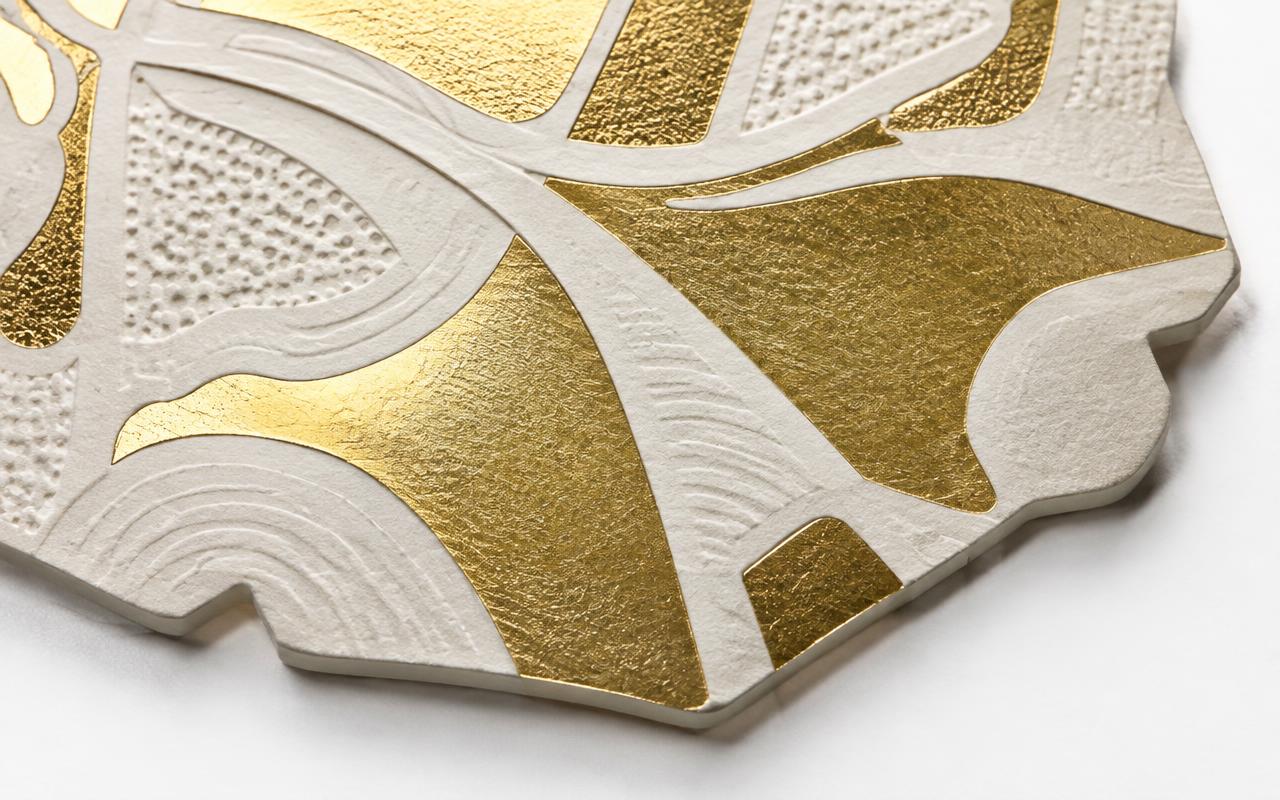 Gold foil stamping and embossing on card stock